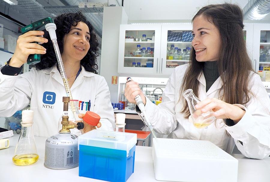 female biotech researchers
